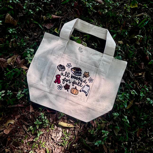 All booked for fall embroidered mini tote bag